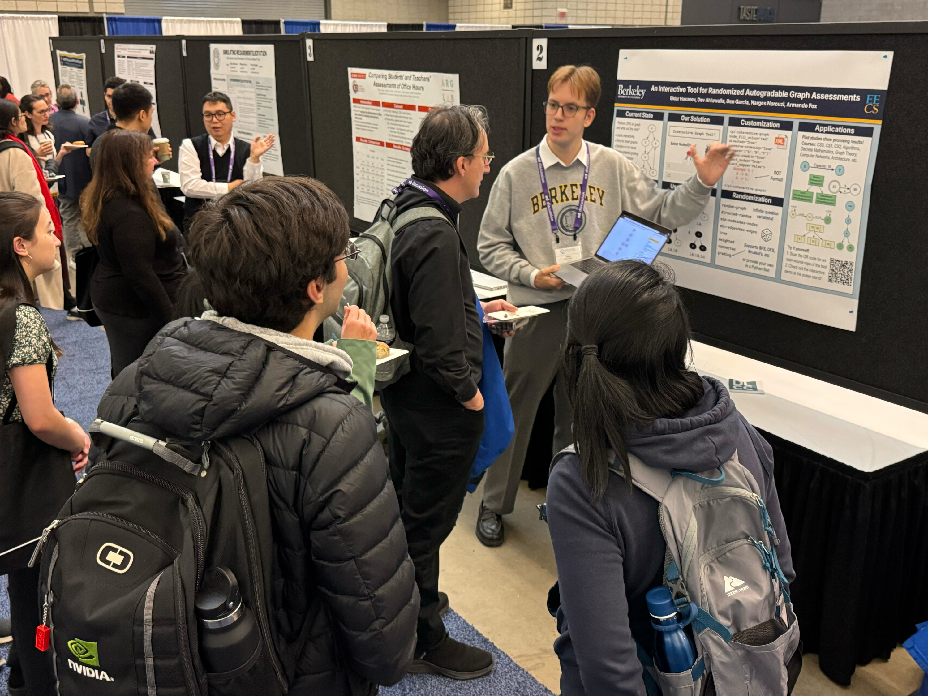 Presenting the interactive graph assessment poster at SIGCSE TS 2025 in Pittsburgh, talking with attendees